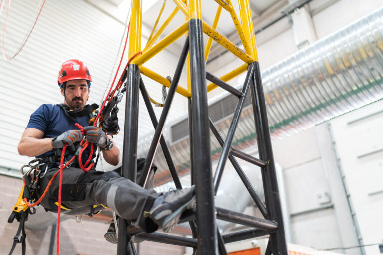 Telecommunication manual high worker engineer climbing an antenna